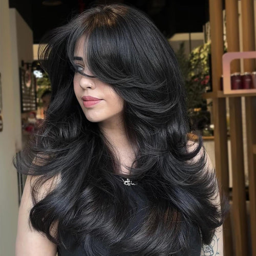 Aisaide Long Wavy Black Layered Wig with Curtain Bangs for Black Women,Synthetic Layered Long Wavy Wig Butterfly Haircut with Thin Hair for Women 24inch(1B)